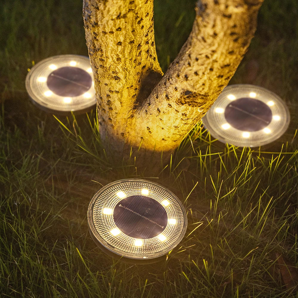 "Shine Bright Solar Ground Lights: Illuminate Your Outdoor Oasis with Waterproof LED Brilliance!"