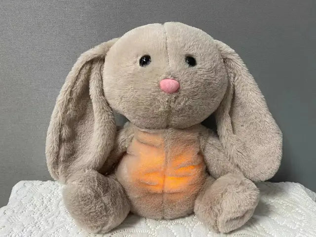 Soothing Sleep Companion: Plush Toy with Music, Lights, and Sound